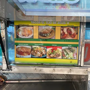 a food truck with a menu