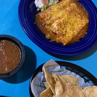 Chips and salsa with enchiladas.