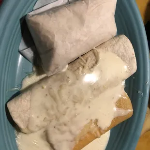 two burritos on a blue plate