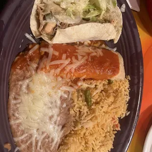 Combination Dinner with Shredded Chicken Taco, cheese enchilada, rice and beans