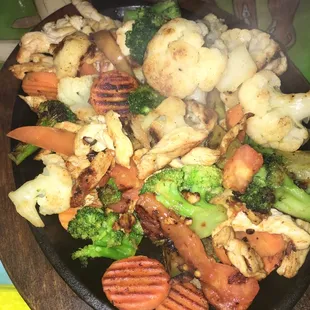 Fajitas with added veggies to substitute rice and beans. Super awesome flavor!