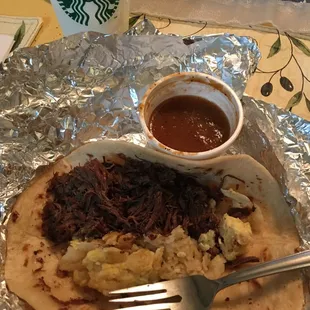 BEST tacos!!! barbacoa taco mixed w/potato &amp; egg. Barbacoa is lean!!! Salsa A++. Support this business.. I come from Houston