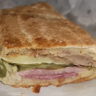 Half of a Cuban sandwich
