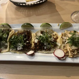 Carnitas, al pastor, carne asada, chicken Mexican street tacos