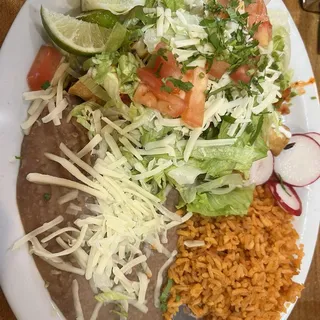 3 Chicken or Shredded beef Taquitos with Rice and Beans