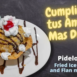 a plate of food with whipped cream and ice cream