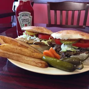 a plate with a sandwich and french fries