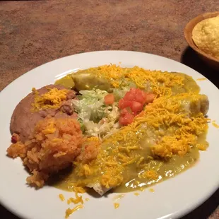 Pork and avocado burrito with rice and beans