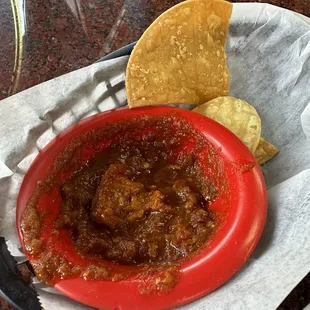 Salsa &amp; chips- served warm.  Not too spicy, good flavor.