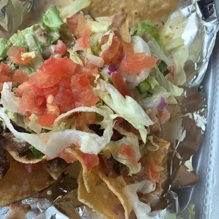 Chips are stale. Barely any meat on here. No salsa in the bag like I asked. Never coming here again. Also my agua de melon was disgusting.