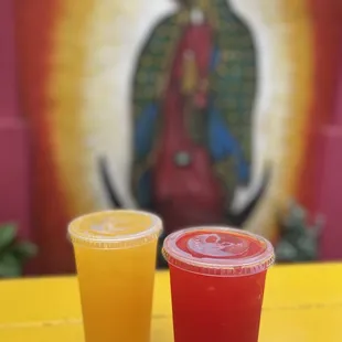 two drinks on a yellow table