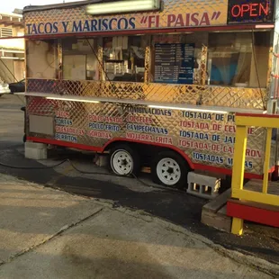 a food truck parked in a parking lot