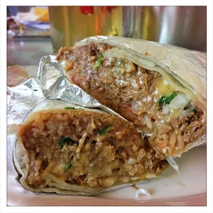 The carne asada burrito ($3.00) w/ cheese ($0.50). A bit dry, I'd suggest paying an extra $0.50 for some sour cream.
