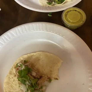 Corn tortilla &amp; carnita de puerco...excellent meat was moist...had to pay for the chile..2 small plastic containers