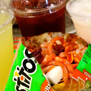 a bag of chips and a drink