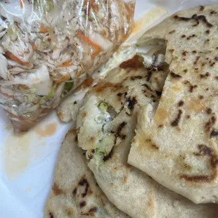 Got my order wrong. They gave me zucchini pupusas instead of revuelta.