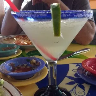 Out of the ordinary. Next to old train depot.  Great food and margaritas. Candice was great!