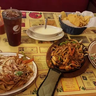 a variety of mexican food on a table