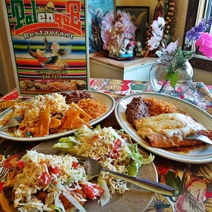 a table full of mexican food