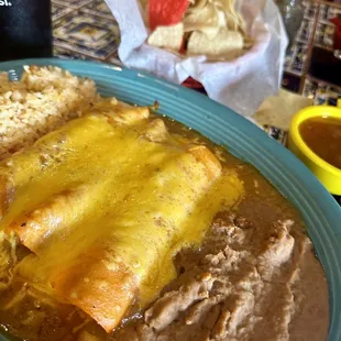 Yum O! The perfect plate!! Enchiladas with Chixken Fajita rice and beans!!!