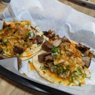 Carnitas and lengua tacos
