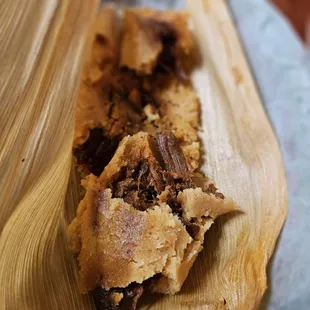 "Tamale" microwaved to an early death by the "chef" .. disgustingly  over heated in the microwave. Literally hard to the touch