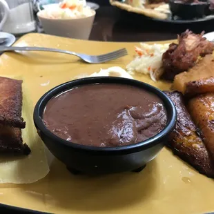 a plate of food and a cup of coffee