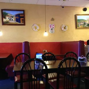 a man sitting at a table in a restaurant