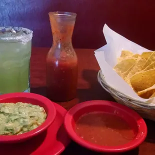 mexican food and drinks on a table