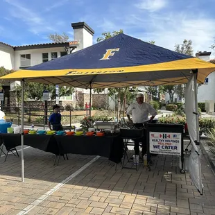 a man selling fresh produce