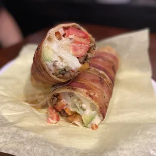 Arizona bacon wrapped burrito: with slice avocado and chopped tomatoes!