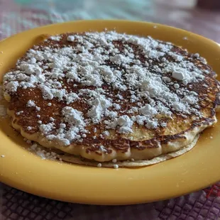 Pancake with a side of powdered sugar