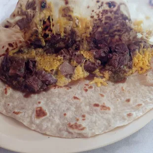 Carne guisada with yellow cheese!