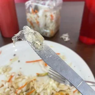 a plate of food with a fork on it