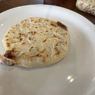 Pupusa with beans and cheese