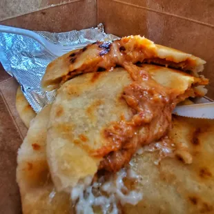 Inside a bean and cheese pupusa