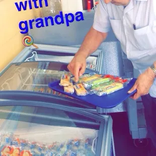 a man putting food in a pan