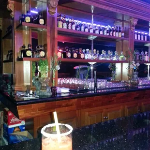 a drink on a bar counter