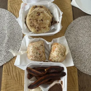 salsa, 6 pupusas, 2 pouches of curtido (larger pouch is extra $3), fried plantains with black beans and crema