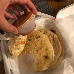 3 Pupusas, 1 salsa, 1 small bag of curtido. (2022)