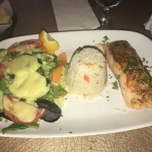 Grilled atlantic salmon with rice.