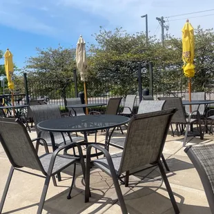 tables and chairs on a patio