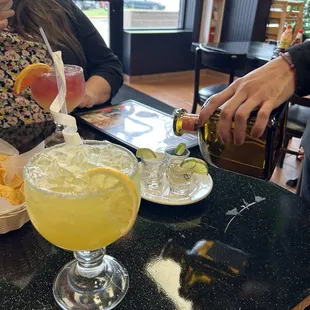 Passion fruit margarita was sooo good!  They pour the tequila shots at the table.