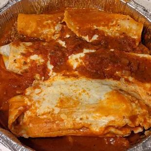 Beef burrito, beef enchilada, and tamale combo