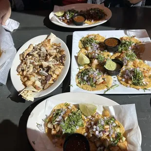 Plaza azteca's tasty tacos ranging from shrimp, tilapia, carne asada (beef), and carnitas (pork) and a queso dip