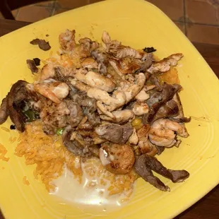 Arroz Pollo con Arroz with added shrimp and steak