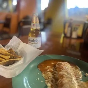 Chicken enchilada, and a Modelo