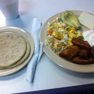 a plate of food and a drink