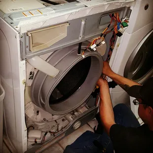 Gasket replacement on GE front loader washer.