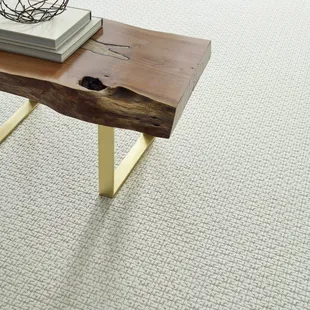 a coffee table with a book on top